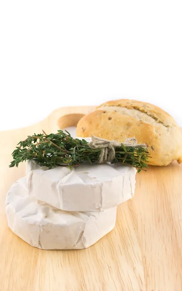 Cheese with white mold and herbs — Stock Photo, Image