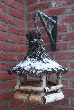 Wooden bird feeder clipart