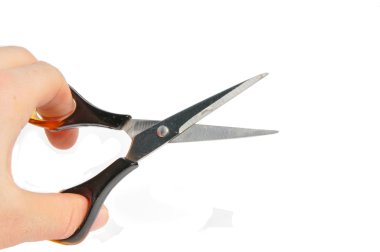 Scissors in hand clipart