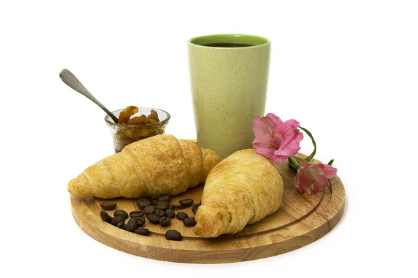 Egy csésze kávé és croissant. — Stock Fotó
