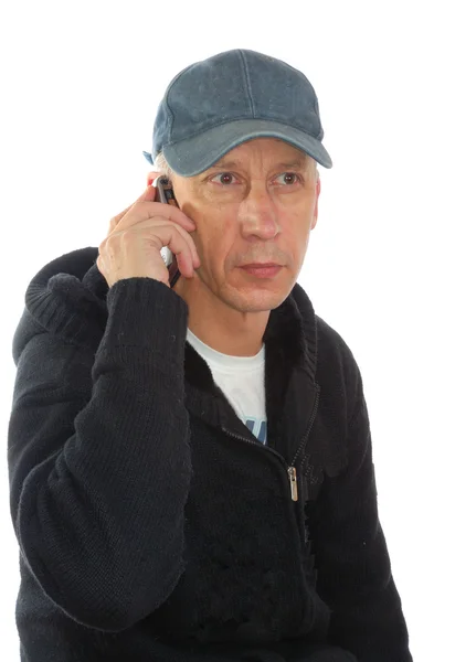Masculino em boné no telefone isolado — Fotografia de Stock