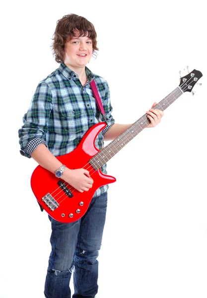 Adolescente tocando baixo elétrico — Fotografia de Stock
