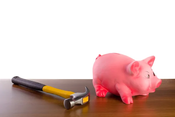 粉红猪存钱罐和锤子 — 图库照片