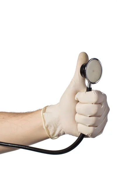 Hand mit Stethoskop — Stockfoto