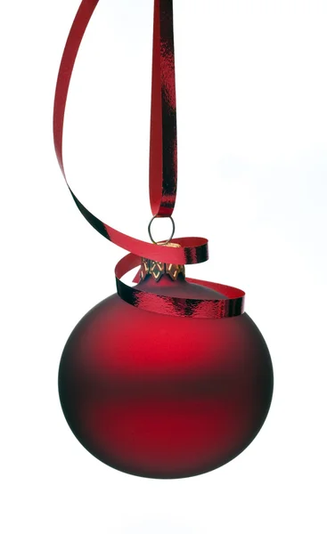 Christmas ball with a curly ribbon — Stock Photo, Image