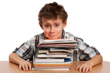 Schoolboy displeased by the homework clipart