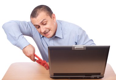 Businessman fixing laptop clipart