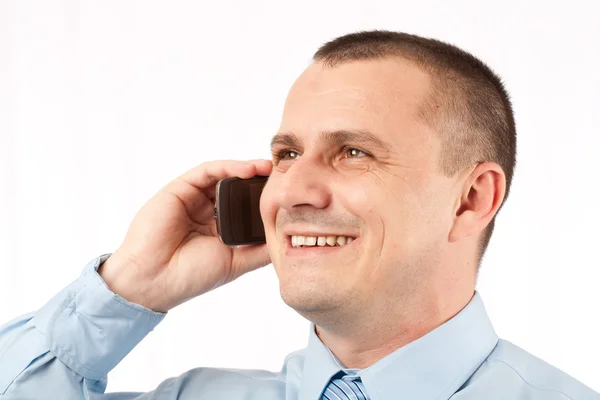 Молодой бизнесмен с помощью мобильного телефона — стоковое фото