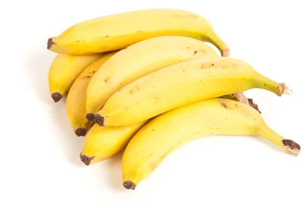 Спелые бананы, изолированные на белом — стоковое фото