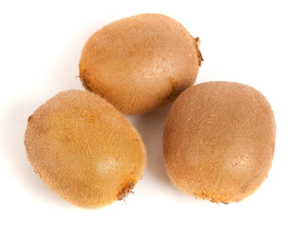 Drie hele kiwi vruchten — Stockfoto