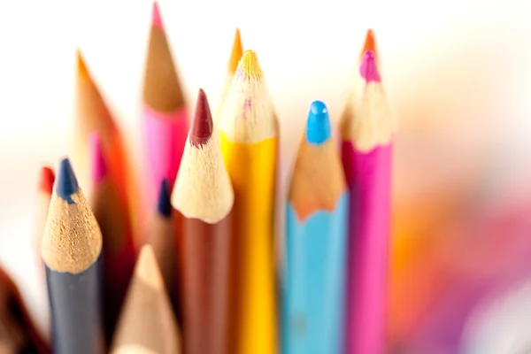 Many pencils over blurred background — Stock Photo, Image