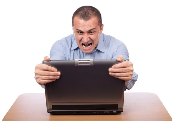 Hombre de negocios enojado en el ordenador portátil —  Fotos de Stock