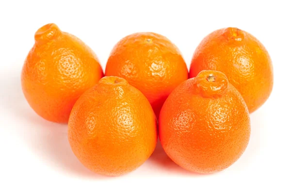 Naranjas maduras aisladas en blanco Fotos de stock libres de derechos