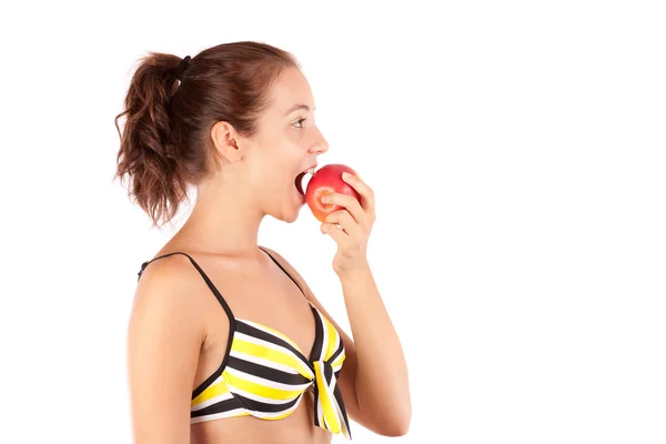 Молодая леди ест яблоко, диета концепции — стоковое фото