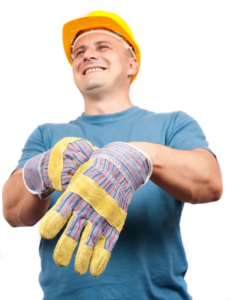 Μπλε γιακά εργαζομένων βάζοντας γάντια — Φωτογραφία Αρχείου