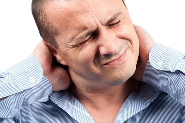 Молодой бизнесмен с болью в шее — стоковое фото