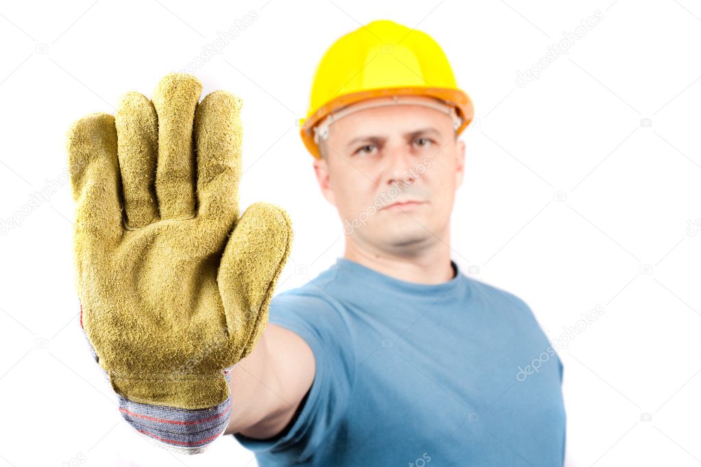 Blue collar worker making stop sign Stock Photo by ©Xalanx 2011749