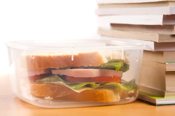 Sandwich and books — Stock Photo, Image