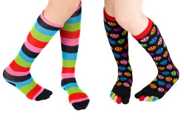 Legs with colorful stockings clipart