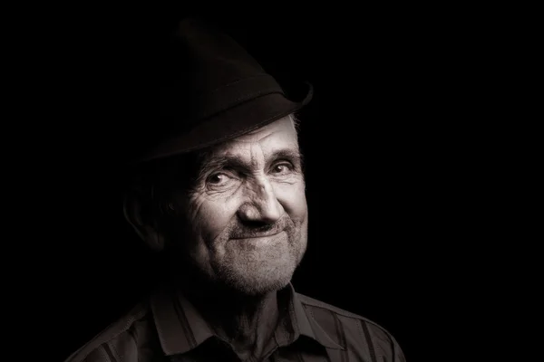 Stary człowiek z czarny kapelusz — Zdjęcie stockowe