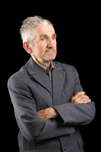 Senior i grå kostym — Stockfoto