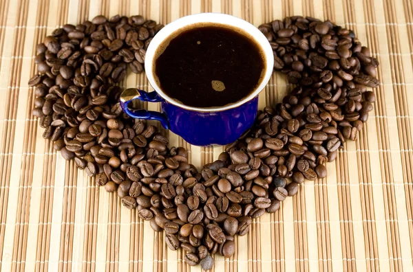 Kaffekopp og kaffebønner – stockfoto