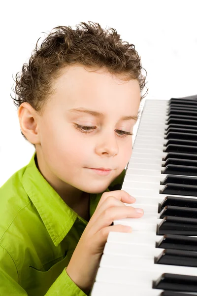 귀여운 아이 피아노 연주 — 스톡 사진