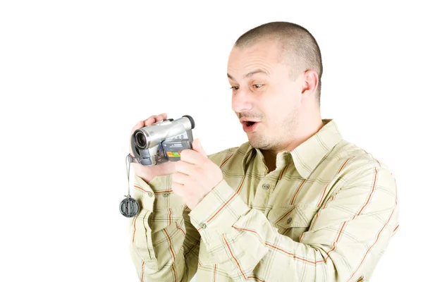 Человек с помощью видеокамеры — стоковое фото