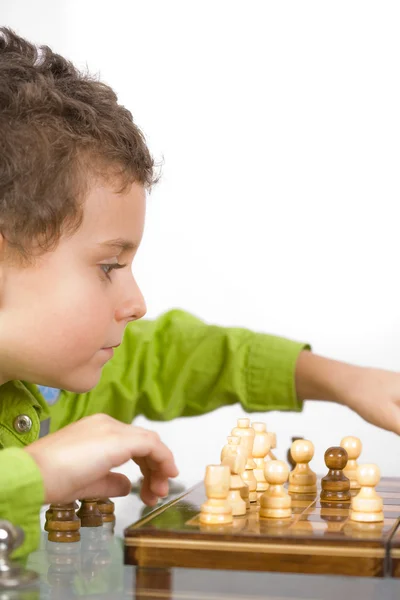 Child playing chess — Stock Photo, Image