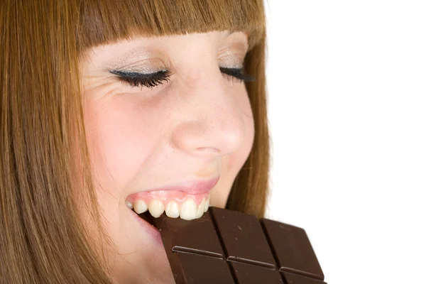 Meisje eten van chocolade — Stockfoto