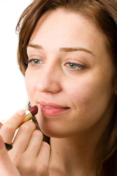 Young woman doing makeup — Stock Photo, Image