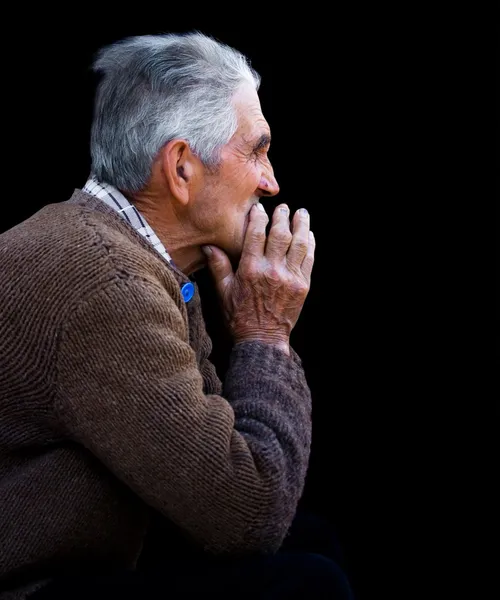 Yaşlı bir adam düşük anahtar portresi — Stok fotoğraf