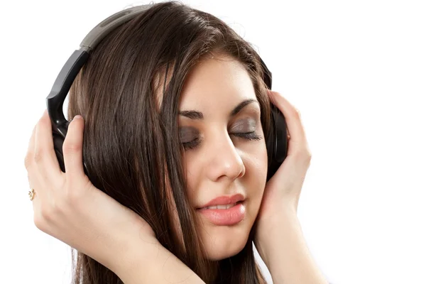 Morena com fones de ouvido — Fotografia de Stock