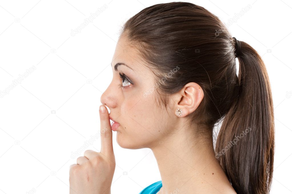 Young lady making silence sign