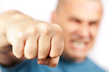 Aggressive man punching clipart