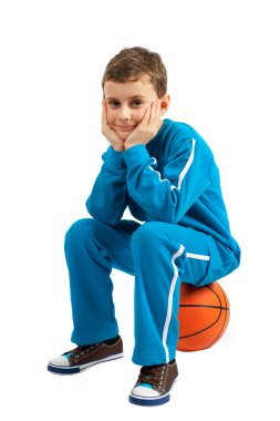 Boy sitting on basketball clipart