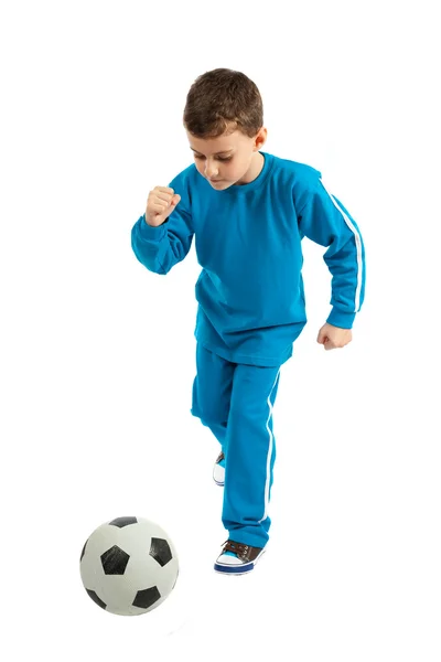 Boy executing a football kick — Stock Photo, Image