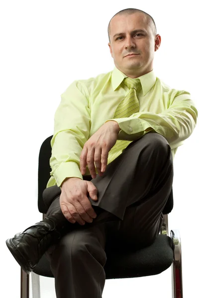 Uomo d'affari seduto in sedia — Foto Stock