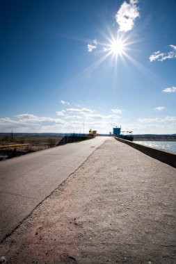 Landscape with road and sun clipart