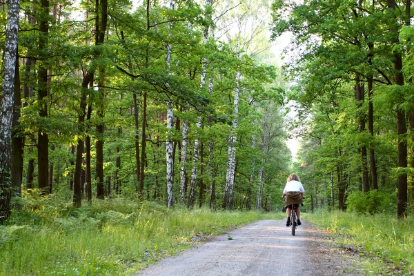 stock image Biker in deep forest