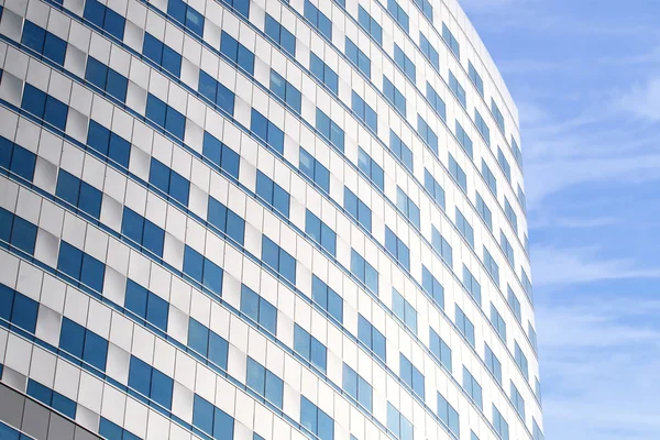 Modern buildings on blue sky background — Stock Photo, Image