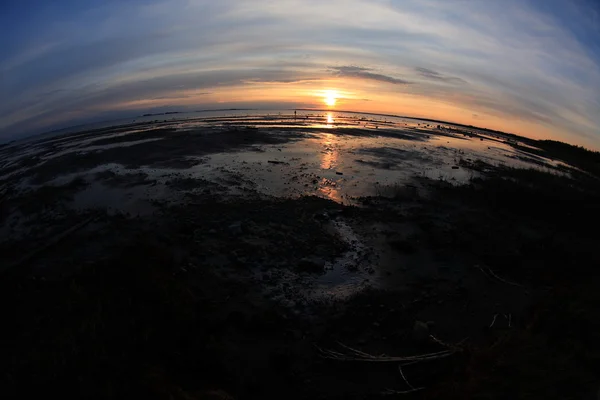 stock image Sunset on the sea shore