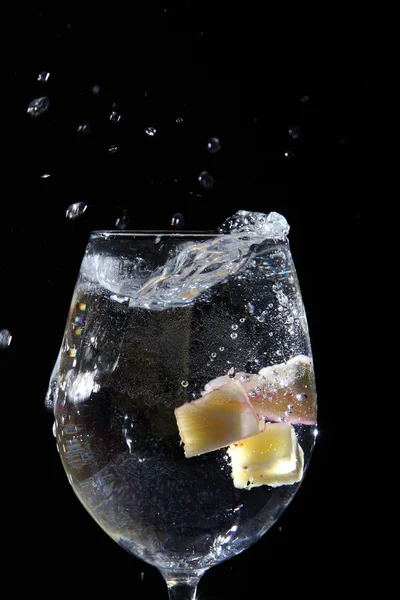 stock image Fruit falling in a glass