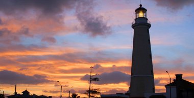 Lighthouse of Punta Del Este at dusk clipart