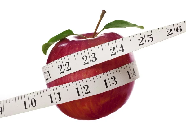 Jabłko i centymetrem — Zdjęcie stockowe