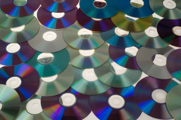 stock image Many Colorful DVDs