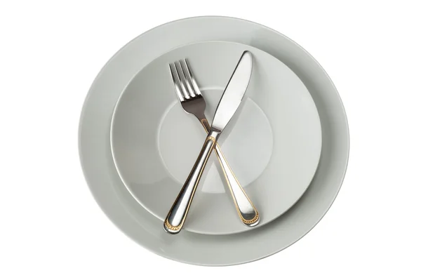叉子和刀叉在盘子上 — 图库照片