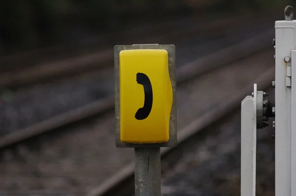 Sinal de telefone amarelo — Fotografia de Stock