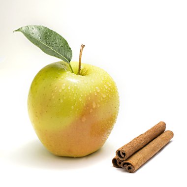 Apple with water drops and cinnamon clipart