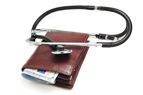 stock image A leather wallet being examined with a s